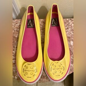AJ VALENCI Yellow slip on flats; worn once; Like new; Size 9.5.